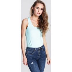 Jasnoniebieski Top Toughness. Niebieskie bluzki damskie marki other, s, z aplikacjami, z dzianiny, bez kołnierzyka, bez rękawów. Za 19,99 zł.