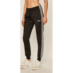 Adidas - Spodnie. Czarne spodnie damskie Adidas, s, z aplikacjami, z bawełny. Za 179,90 zł.