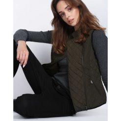 Ciemnozielona Kamizelka Everything I Am. Czerwone kamizelki damskie marki KALENJI, z elastanu, z krótkim rękawem, krótkie. Za 24,99 zł.