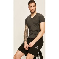 Tommy Hilfiger - Szorty. Czarne spodenki i szorty męskie TOMMY HILFIGER, s, bez wzorów, z elastanu, casualowe. Za 299,90 zł.