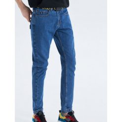 Jeansy Carrot Fit - Granatowy. Niebieskie jeansy męskie marki Cropp, m, bez wzorów. Za 99,99 zł.