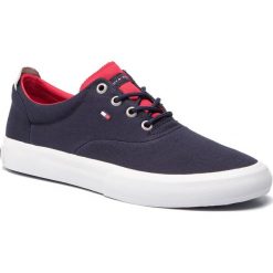 Tenisówki TOMMY HILFIGER - Core Thick Textile Sneaker FM0FM02160 Midnight 403. Niebieskie półbuty męskie TOMMY HILFIGER, bez wzorów, z gumy, bez zapięcia. Za 339,00 zł.