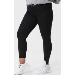 Czarne Legginsy Outlet. Czarne legginsy damskie Born2be, xl, z napisami. Za 29,99 zł.