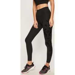 Desigual Sport - Legginsy. Czarne spodnie damskie Desigual Sport, s, bez wzorów, z elastanu. W wyprzedaży za 199,90 zł.