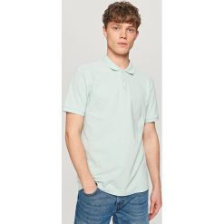Klasyczna koszulka polo - Turkusowy. Niebieskie koszulki polo marki Reserved, m. Za 39,99 zł.