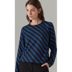 Elegancka bluzka z długimi rękawami - Czarny. Czarne bluzki damskie marki Mohito, bez wzorów, eleganckie, bez kołnierzyka, z długim rękawem. Za 69,99 zł.