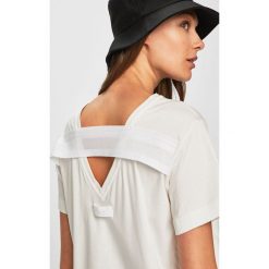 Diesel - T-shirt. Białe bluzki damskie Diesel, s, z poliesteru, z okrągłym kołnierzem. W wyprzedaży za 229,90 zł.