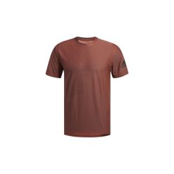 T-shirty z krótkim rękawem adidas FreeLift Tee. Pomarańczowe t-shirty męskie Adidas, s, bez wzorów, bez kołnierzyka, krótkie. Za 199,00 zł.