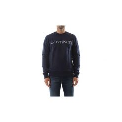 Bluzy Calvin Klein Jeans K10K102724 COTTON LOGO. Niebieskie bluzy męskie Calvin Klein Jeans, s, bez wzorów, z jeansu, bez kołnierzyka, bez rękawów, bez kaptura. Za 294,86 zł.
