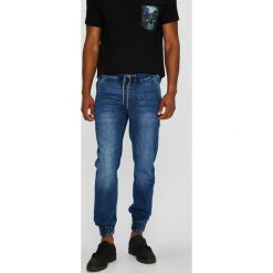 Medicine - Jeansy Basic. Niebieskie jeansy męskie z dziurami marki MEDICINE. W wyprzedaży za 79,90 zł.