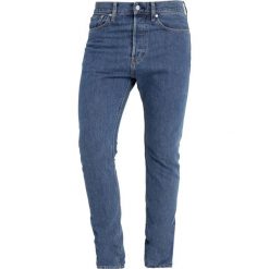 Calvin Klein Jeans 015 SKINNY RIGID Jeans Skinny Fit denim. Niebieskie jeansy męskie marki Calvin Klein Jeans, z bawełny. Za 419,00 zł.