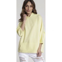 Żółta Bluza Maryliria. Żółte bluzy damskie Renee, xl, z aplikacjami, z dzianiny, z krótkim rękawem, krótkie, z kapturem. Za 79,99 zł.