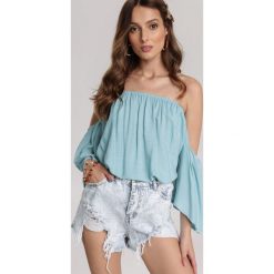 Jasnoniebieska Bluzka Coraelina. Niebieskie bluzki damskie Renee, s, bez wzorów, bez kołnierzyka, bez rękawów. W wyprzedaży za 49,99 zł.