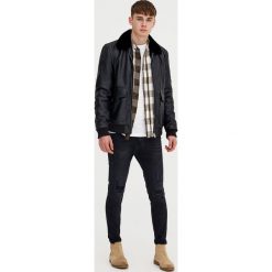 Jeansy carrot fit. Czarne jeansy męskie marki Pull&Bear. Za 139,00 zł.