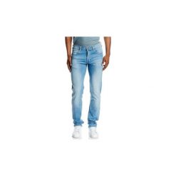 Jeansy slim fit Lee ® Daren Caribbean Ocean 706 BCQH. Niebieskie jeansy męskie relaxed fit marki Lee, z jeansu. Za 219,00 zł.