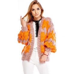 Oversize'owy sweter w pasy multikolor. Swetry damskie z wełny. Za 332,62 zł.