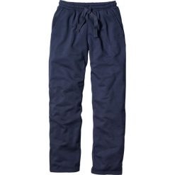 Spodnie sportowe bonprix granatowy. Niebieskie spodnie męskie bonprix, s, w paski, z dzianiny, sportowe. Za 54,99 zł.
