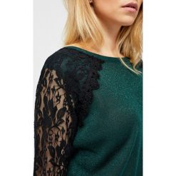 Sweter z koronką. Swetry damskie Moodo, xs, w koronkowe wzory, z koronki, bez rękawów, bez kaptura. Za 39,99 zł.