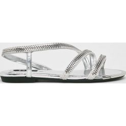 Dkny - Sandały. Szare klapki damskie DKNY, bez wzorów, ze skóry, bez obcasa, na obcasie. W wyprzedaży za 359,90 zł.