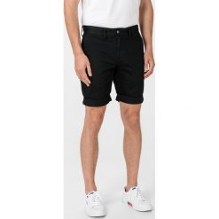 Tommy Jeans Szorty Czarny. Czarne spodenki i szorty męskie Tommy Jeans, bez wzorów, z elastanu. Za 324,95 zł.