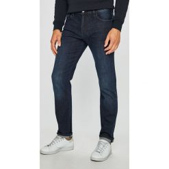 Armani Exchange - Jeansy. Niebieskie jeansy męskie marki Armani Exchange, z aplikacjami, z podwyższonym stanem. W wyprzedaży za 359,90 zł.