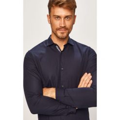 Jack & Jones - Koszula. Białe koszule męskie Jack & Jones, s, bez wzorów, z bawełny, eleganckie, z klasycznym kołnierzykiem, z długim rękawem. W wyprzedaży za 129,90 zł.