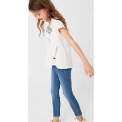 Mango Kids - Jeansy dziecięce Rosannah 110 cm. Niebieskie jeansy dziewczęce marki Mango Kids, z bawełny. W wyprzedaży za 29,90 zł.