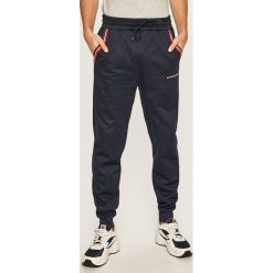 Tommy Sport - Spodnie. Niebieskie spodnie męskie Tommy Sport, s, bez wzorów, z poliesteru, sportowe. Za 399,90 zł.
