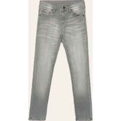 G-Star Raw - Jeansy dziecięce 128-176 cm. Szare spodnie chłopięce G-Star RAW, bez wzorów, z elastanu, retro, z podwyższonym stanem. W wyprzedaży za 159,90 zł.