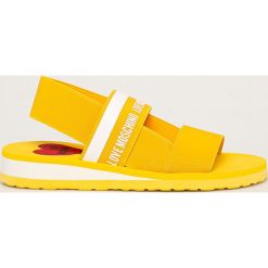 Love Moschino - Sandały. Żółte klapki damskie Love Moschino, bez wzorów, z gumy, bez obcasa, na obcasie. Za 419,90 zł.