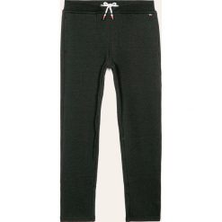 Tommy Hilfiger - Spodnie dziecięce 128-176 cm. Czarne spodnie chłopięce TOMMY HILFIGER, bez wzorów, z elastanu. W wyprzedaży za 199,90 zł.