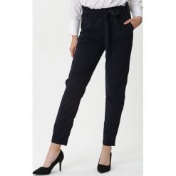 Granatowe Spodnie Georgina. Spodnie damskie Born2be, xl, bez wzorów, z tkaniny, eleganckie, długie. Za 59,99 zł.