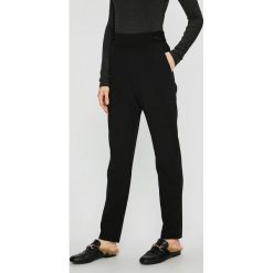 Jacqueline de Yong - Spodnie. Czarne spodnie damskie Jacqueline de Yong, s, z elastanu. W wyprzedaży za 49,90 zł.