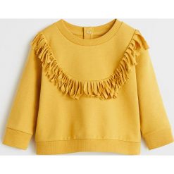 Mango Kids - Bluza dziecięca Fuji 80-104 cm. Żółte bluzy dziewczęce Mango Kids, z aplikacjami, z bawełny, bez rękawów, bez kaptura. Za 59,90 zł.