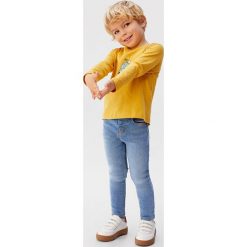 Mango Kids - Jeansy dziecięce Diego 80-104 cm. Niebieskie spodnie chłopięce Mango Kids, bez wzorów, z elastanu. Za 59,90 zł.
