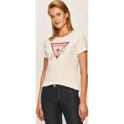 Guess Jeans - T-shirt. Żółte bluzki damskie Guess Jeans, s, z nadrukiem, z bawełny, z okrągłym kołnierzem. Za 189,90 zł.