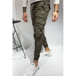 Męskie spodnie DANINO KHAKI. Brązowe jeansy męskie IVET, m, bez wzorów, sportowe. W wyprzedaży za 79,00 zł.