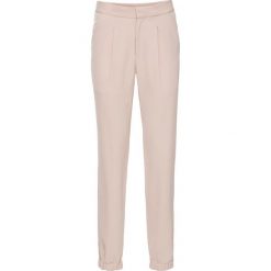 Spodnie Loose Fit bonprix cielisty. Brązowe spodnie sportowe damskie marki bonprix, w paski. Za 109,99 zł.