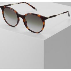 Calvin Klein Okulary przeciwsłoneczne brown. Brązowe okulary przeciwsłoneczne damskie aviatory Calvin Klein. W wyprzedaży za 503,20 zł.