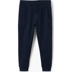 Mango Kids - Spodnie dziecięce Jumbo 104-164 cm. Czarne spodnie chłopięce marki Mango Kids, z bawełny. W wyprzedaży za 39,90 zł.