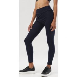 Granatowe Legginsy Vylnessa. Niebieskie legginsy damskie Born2be, s, bez wzorów. Za 69,99 zł.
