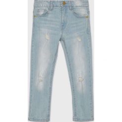 Blukids - Jeansy dziecięce 104-134 cm. Niebieskie spodnie chłopięce Blukids, z elastanu. W wyprzedaży za 49,90 zł.