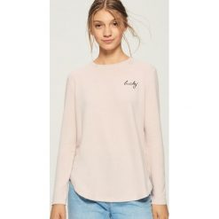 Sweter z haftowanym napisem - Różowy. Różowe bez kategorii Sinsay, s. Za 39,99 zł.