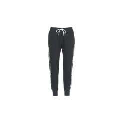 Spodnie treningowe Under Armour TB OTTOMAN FLEECE PANT. Szare bryczesy damskie marki Under Armour, l, z dzianiny. Za 259,00 zł.