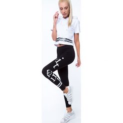 Legginsy z aplikacją na nogawce czarne 8042. Czarne legginsy damskie Fasardi, l, z aplikacjami. Za 31,20 zł.