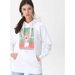 Bluza ze sportowym motywem - Biały. Białe bluzy sportowe damskie House, s, bez wzorów, bez rękawów, bez kaptura. Za 99,99 zł.