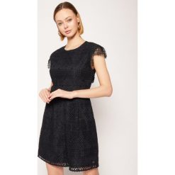 Kombinezon TOMMY HILFIGER Oc Peche WW0WW27871. Niebieskie kombinezony damskie TOMMY HILFIGER, bez wzorów, z bawełny, bez kołnierzyka, bez rękawów. W wyprzedaży za 899,00 zł.