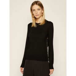 Sweter Tory Burch 59898. Czarne swetry damskie Tory Burch, m, bez wzorów, klasyczne, bez rękawów, bez kaptura. W wyprzedaży za 569,00 zł.