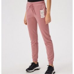 Spodnie jogger z nadrukiem - Różowy. Różowe spodnie damskie Sinsay, xl. Za 49,99 zł.