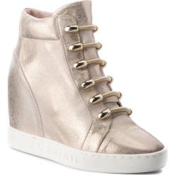 Sneakersy CARINII - B4130 F76-000-000-B88. Żółte półbuty damskie marki Carinii, bez wzorów, ze skóry, bez obcasa, na obcasie, bez zapięcia. W wyprzedaży za 239,00 zł.